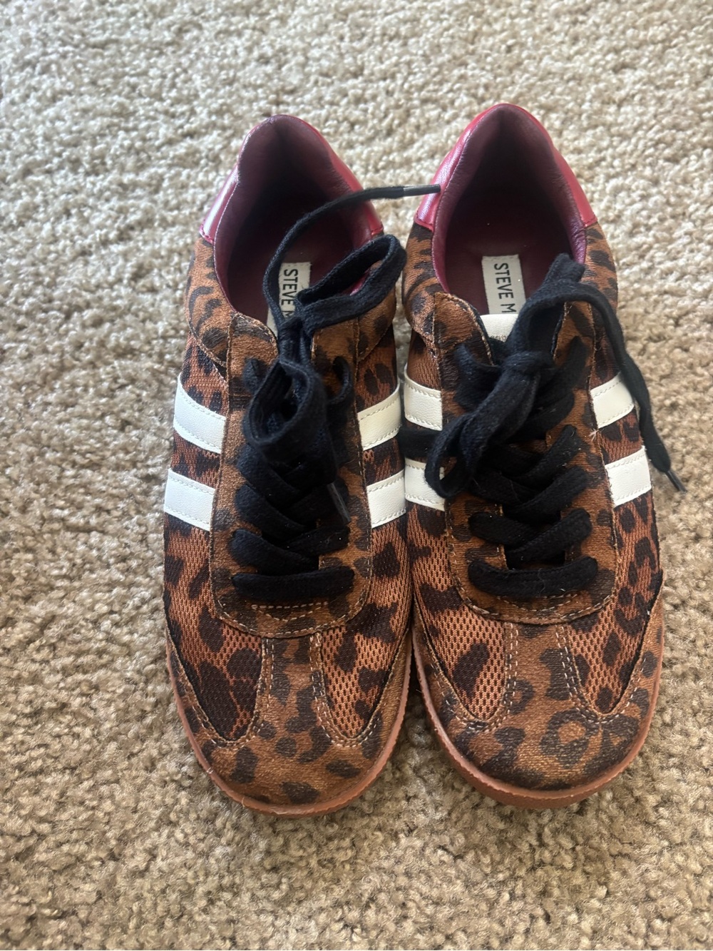 Steven Madden Leopard Print sneakers with red heel and white stripes